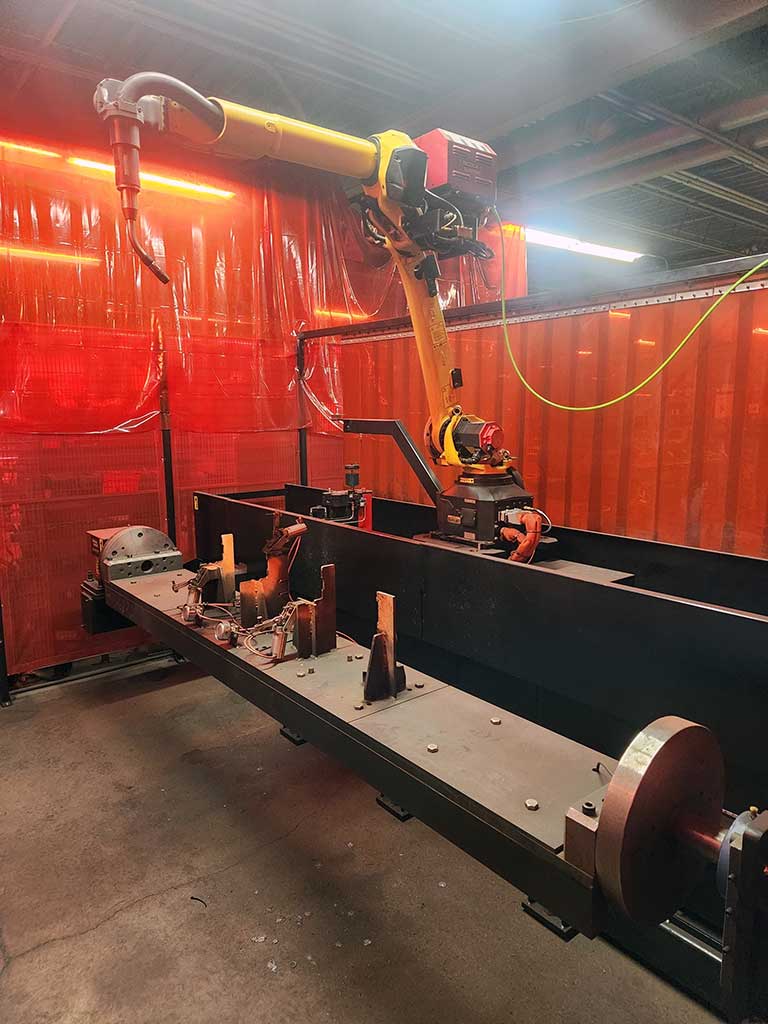Robotic welding arm
